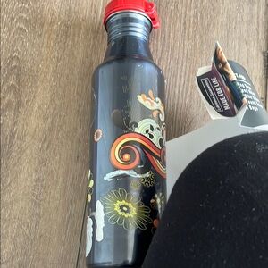 Hydra Peak Black Water Bottle with Floral Design and Red Cap. Never used!